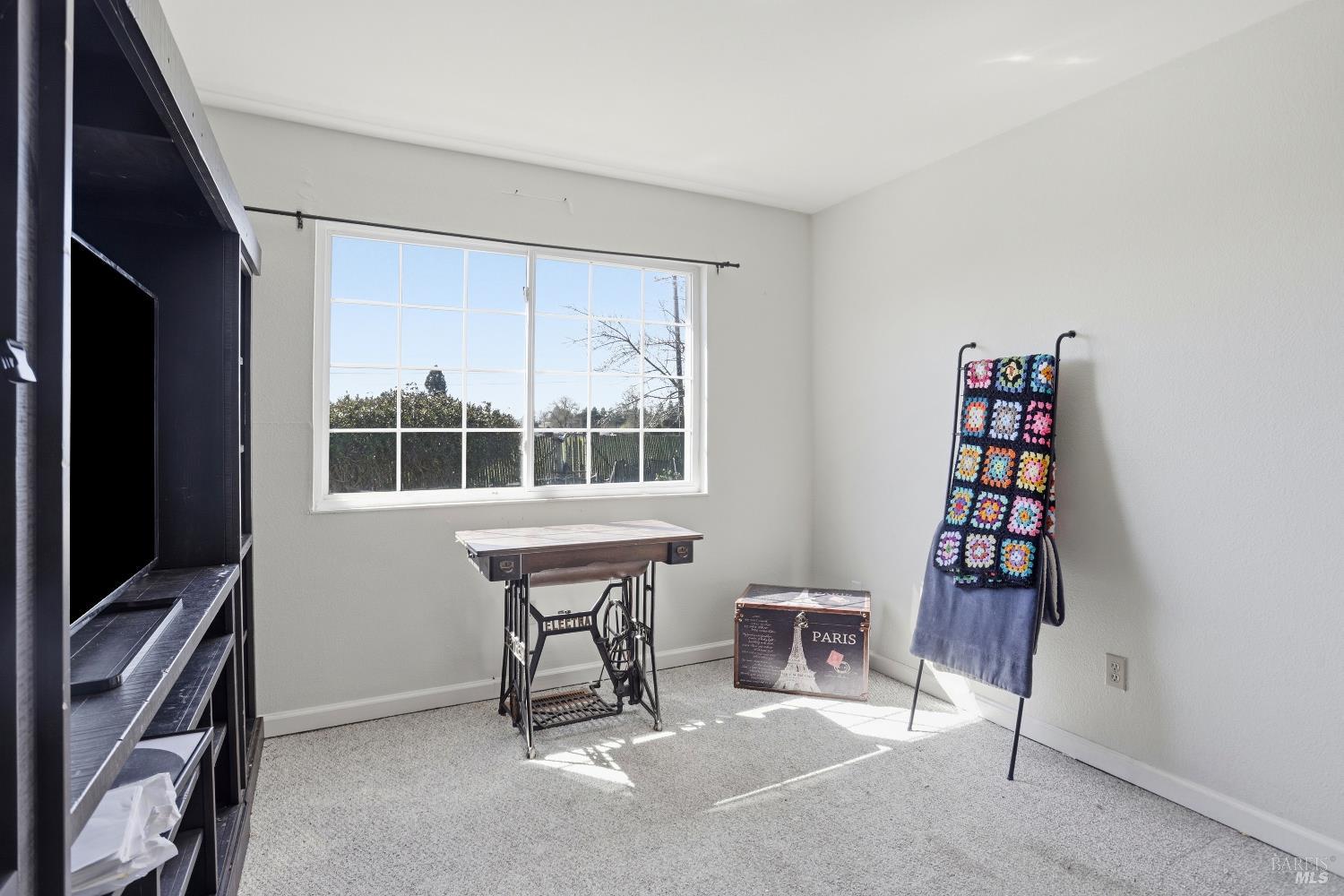 1407 Georgia Court Rohnert Park, CA 94928 - Photo 21 of 36 a view of a workspace with furniture and natural light
