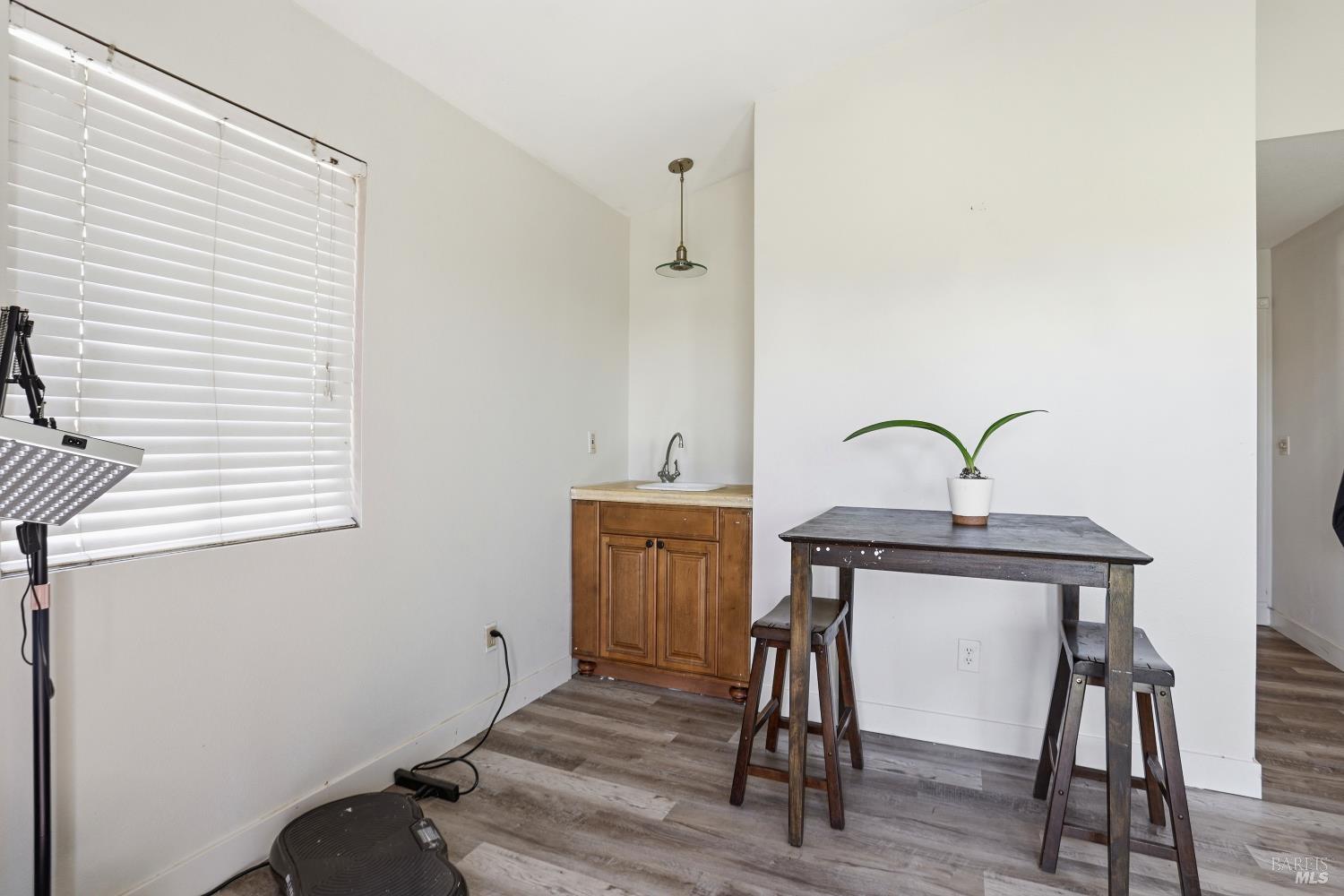 1407 Georgia Court Rohnert Park, CA 94928 - Photo 23 of 36 a view of a room with a table and chairs
