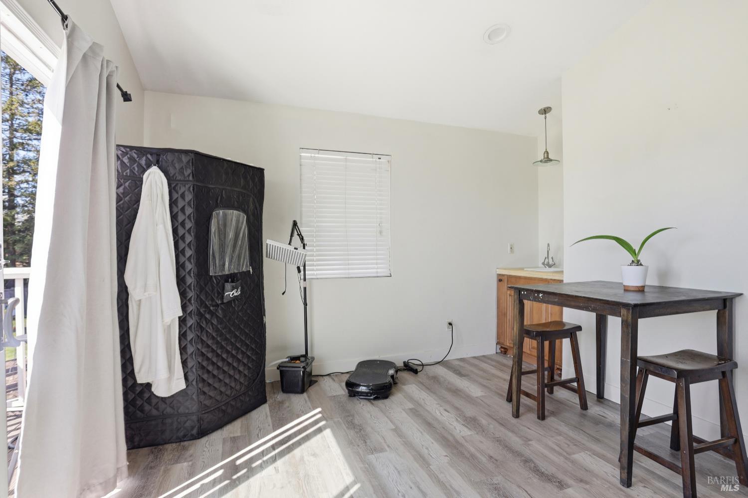 1407 Georgia Court Rohnert Park, CA 94928 - Photo 24 of 36 a view of a workspace with furniture and wooden floor
