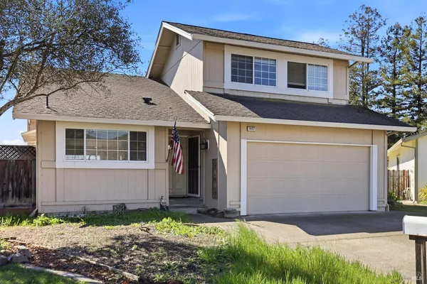a front view of house with yard