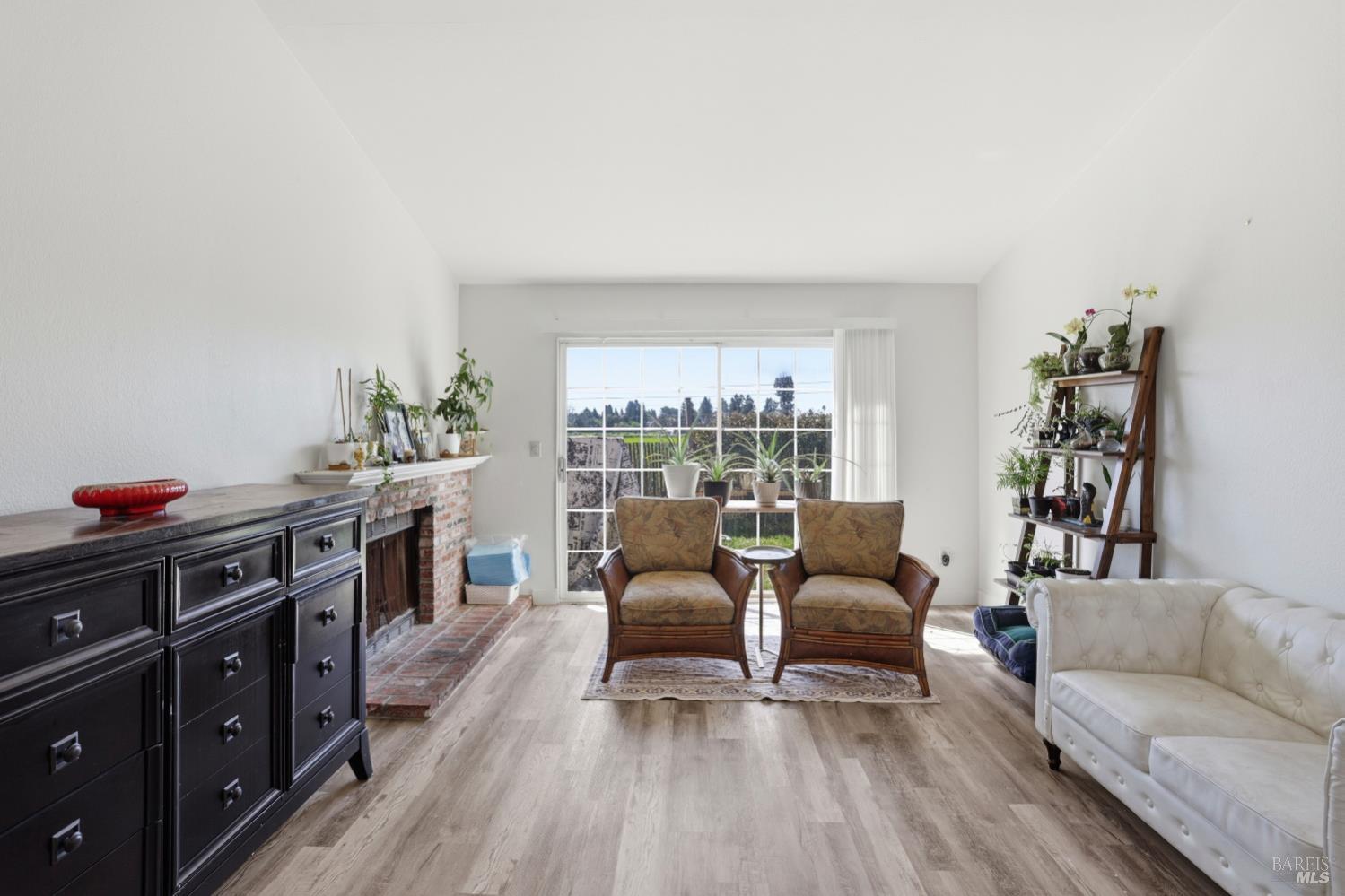 1407 Georgia Court Rohnert Park, CA 94928 - Photo 6 of 36 a living room with furniture and a wooden floor