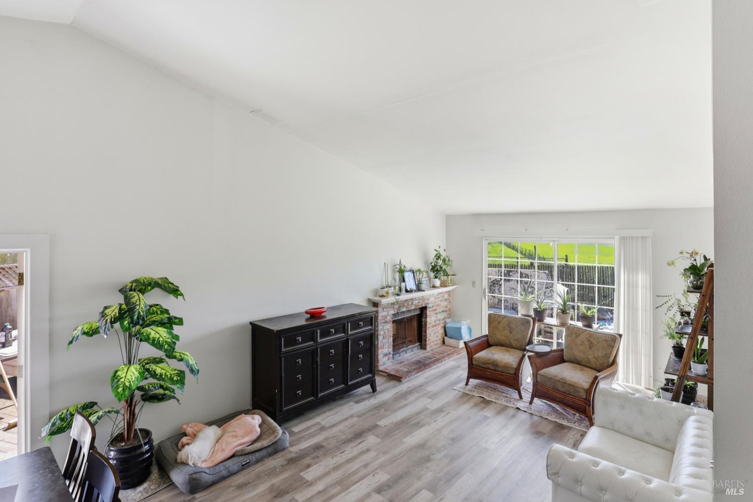 1407 Georgia Court Rohnert Park, CA 94928 - Photo 8 of 36 a living room with furniture and a large window