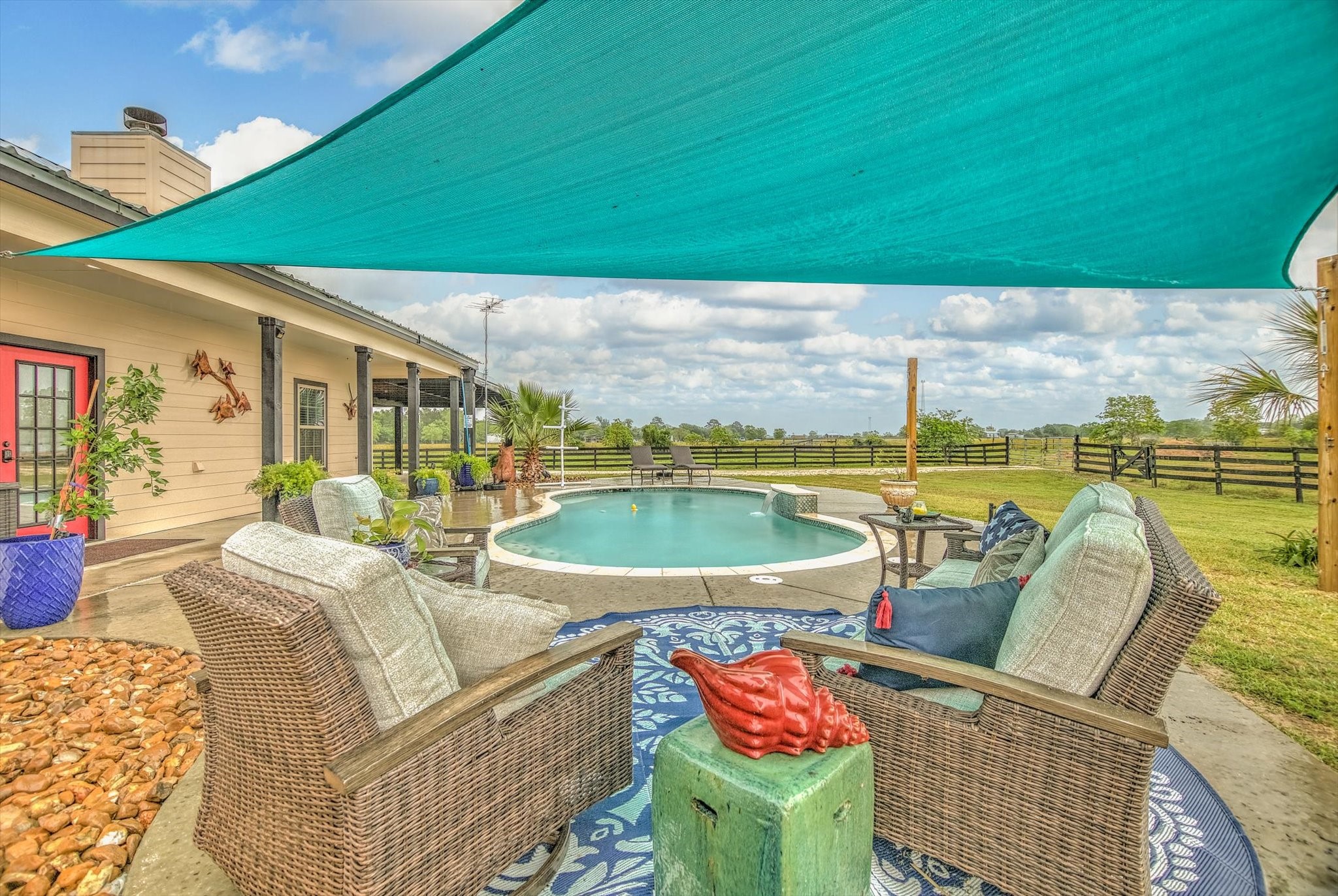 1755 McBride-Devillier Loop Winnie, TX 77665 - Photo 31 of 44 a outdoor space with patio area