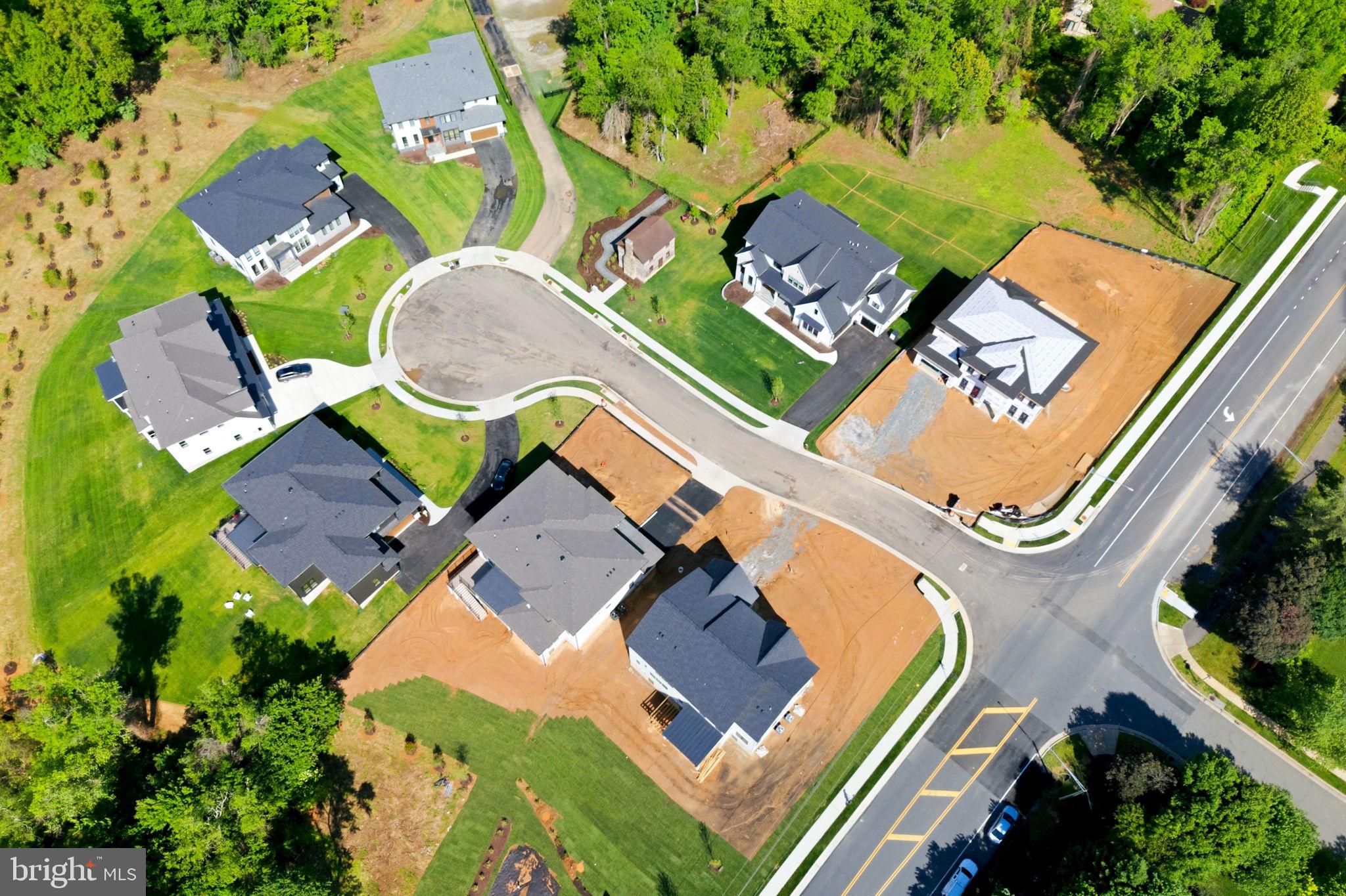 10801 Mason Hunt Court Reston, VA 20190 - Photo 12 of 26 an aerial view of a house with a swimming pool and outdoor space