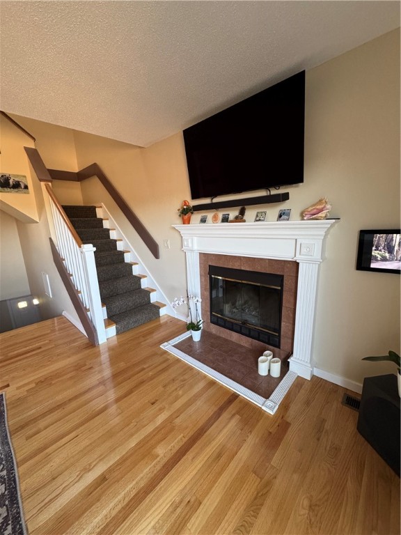 18 Palmer Circle Hopkinton, RI 02832 - Photo 13 of 31 Fireplace - 1 of 2. (Stairs to top fl 3)
