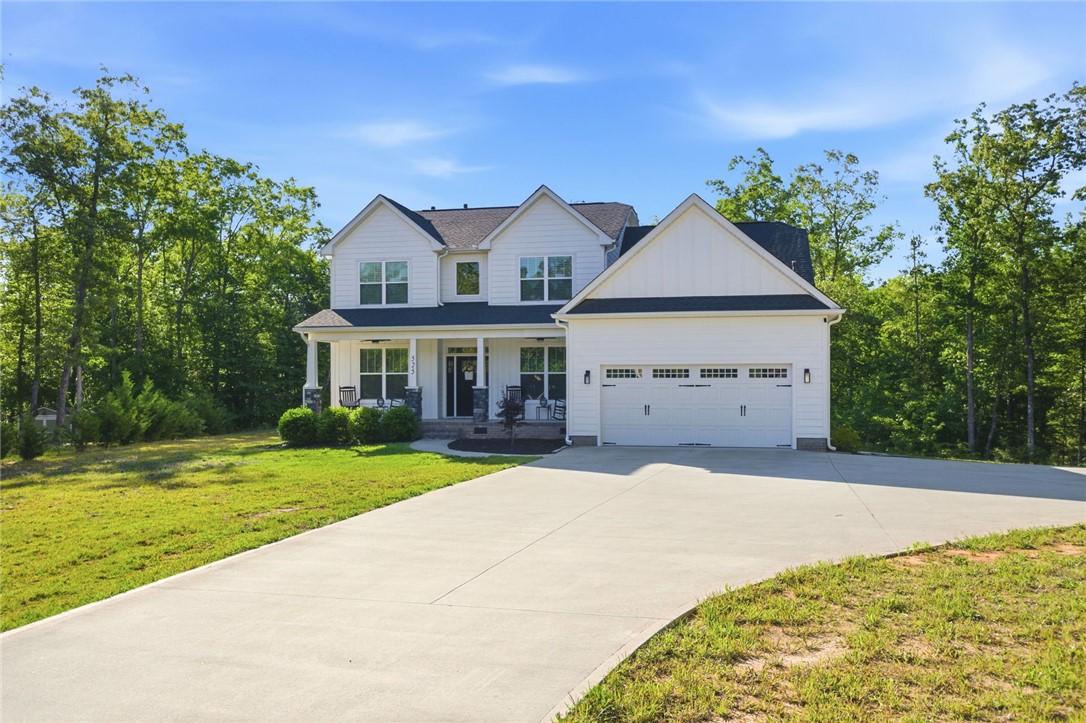 525 16th Circle Walhalla, SC 29691 - Photo 1 of 50 This inviting residence features a well-maintained lawn and a convenient attached garage.