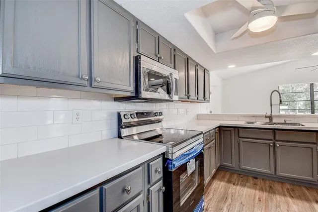 a bathroom with a sink a toilet and a bathtub