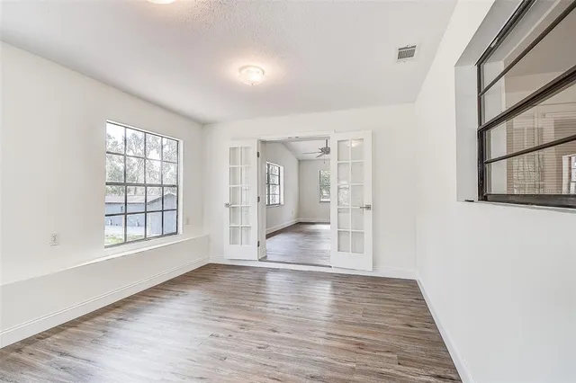 a view of a tree in front of a house