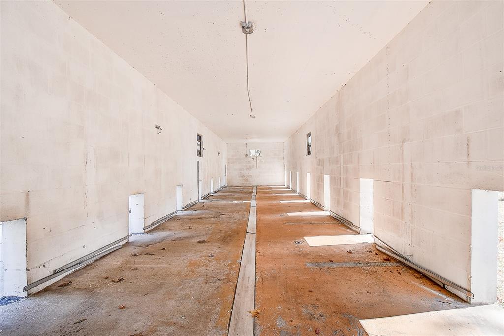 6234 Neff Lake Road Brooksville, FL 34601 - Photo 42 of 59 a view of a hallway with windows