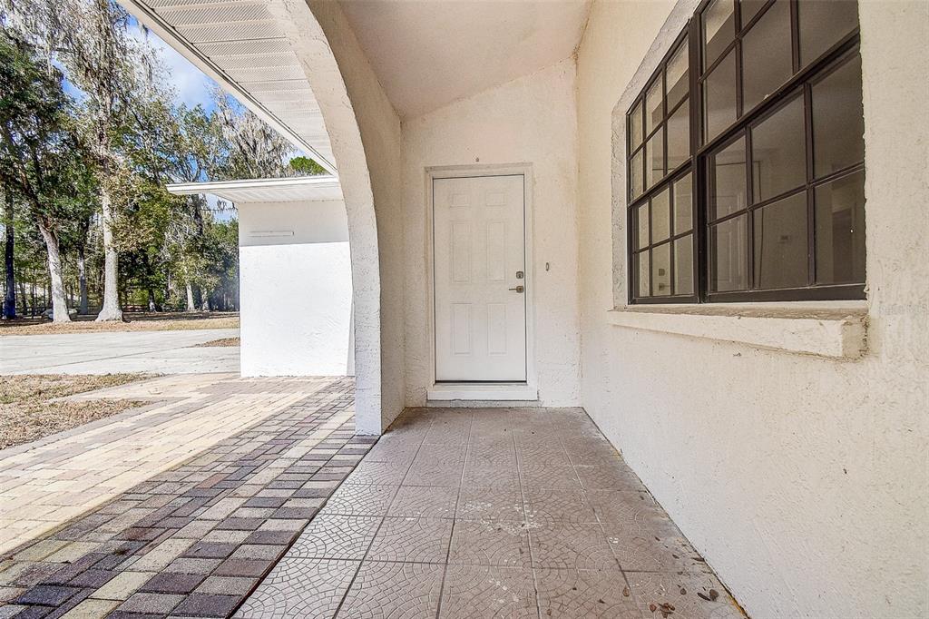 6234 Neff Lake Road Brooksville, FL 34601 - Photo 6 of 59 a view of a door and a window