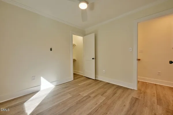 a view of a livingroom with wooden floor