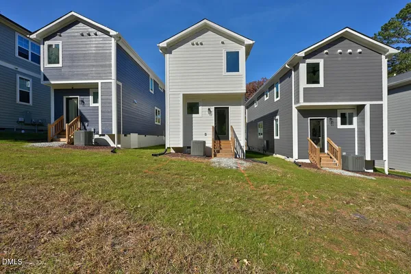 a view of a bench in a backyard