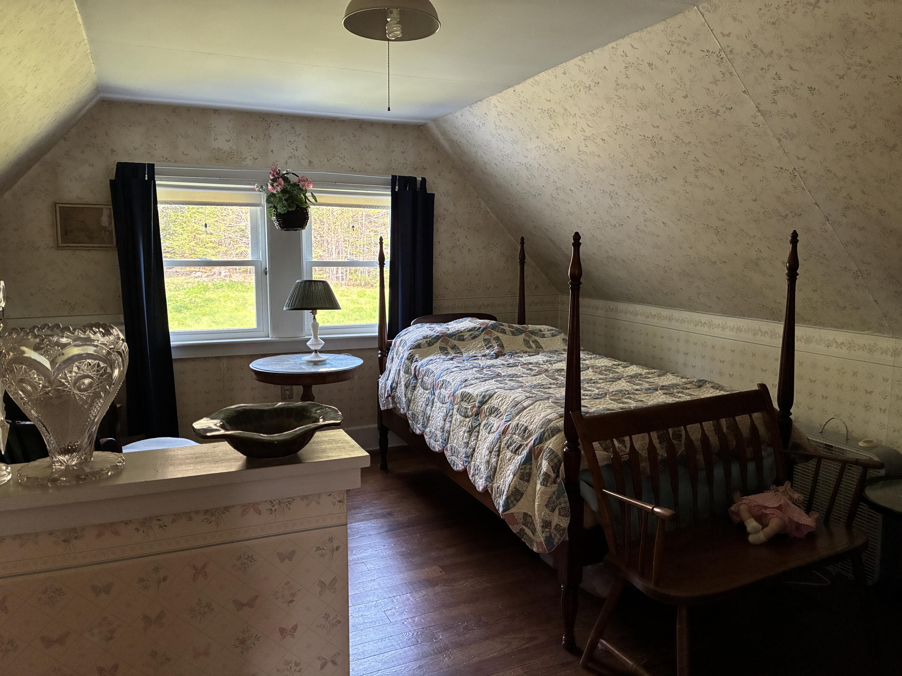 707 Newbury Neck Road Surry, ME 04684 - Photo 25 of 40 Summer sleep space in ell.