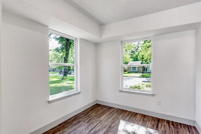 an empty room with windows