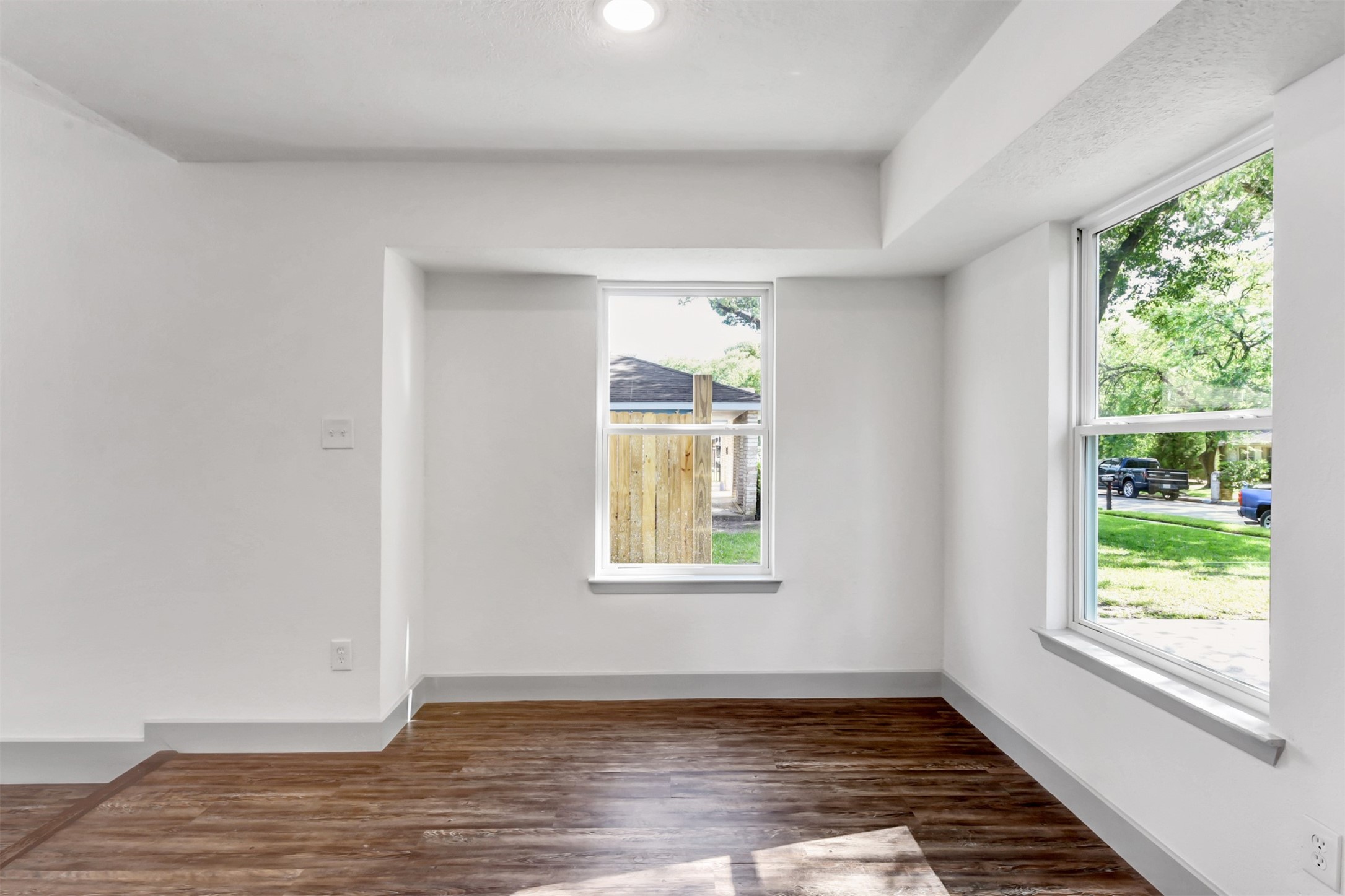 23118 Whispering Willow Drive Spring, TX 77373 - Photo 15 of 37 an empty room with wooden floor and windows