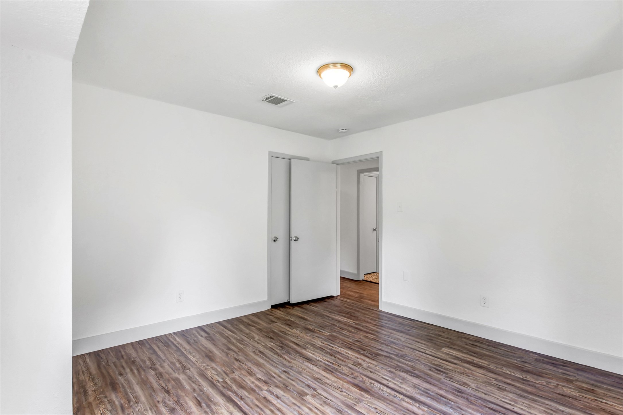 23118 Whispering Willow Drive Spring, TX 77373 - Photo 20 of 37 a view of an empty room with wooden floor