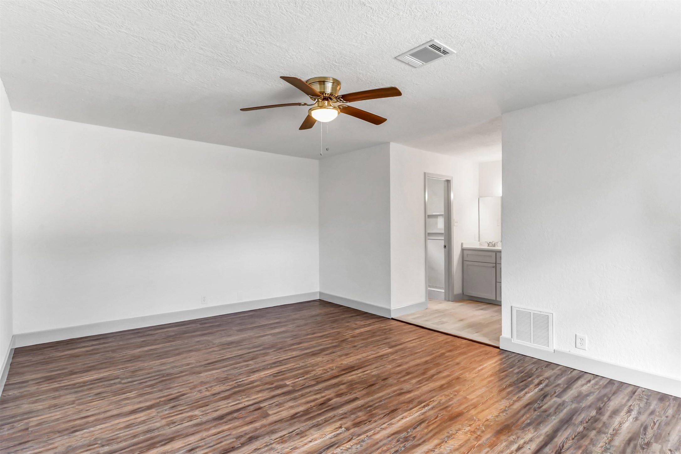 23118 Whispering Willow Drive Spring, TX 77373 - Photo 23 of 37 wooden floor in an empty room