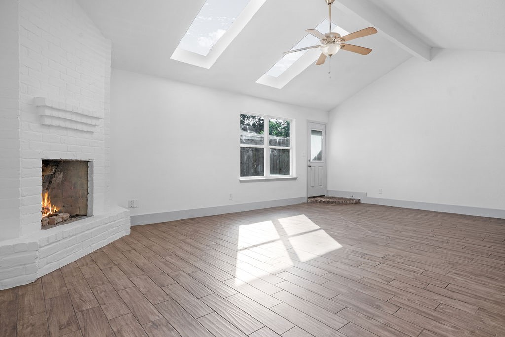 23118 Whispering Willow Drive Spring, TX 77373 - Photo 7 of 37 a view of empty room with wooden floor and fan