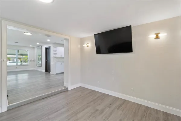 a view of a livingroom with a flat screen tv