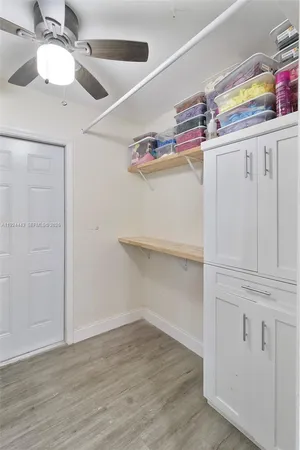 a view of a room with racks on the wall