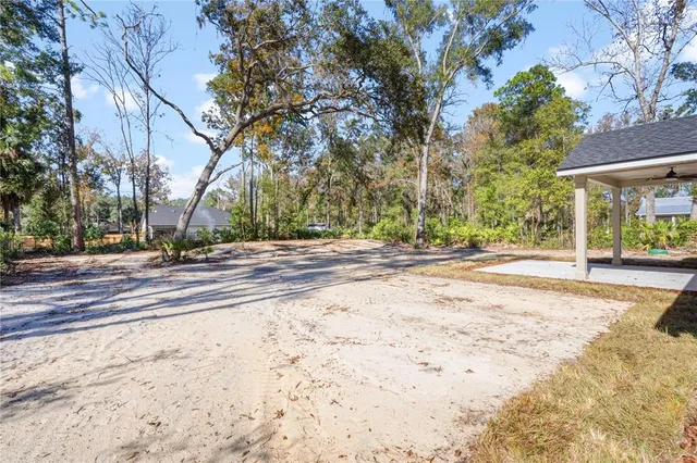 a view of road with trees