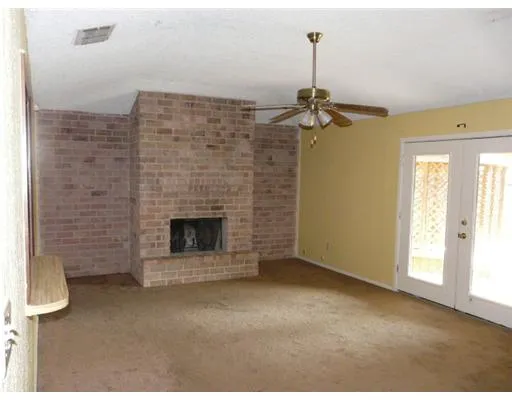 a living room with a fireplace