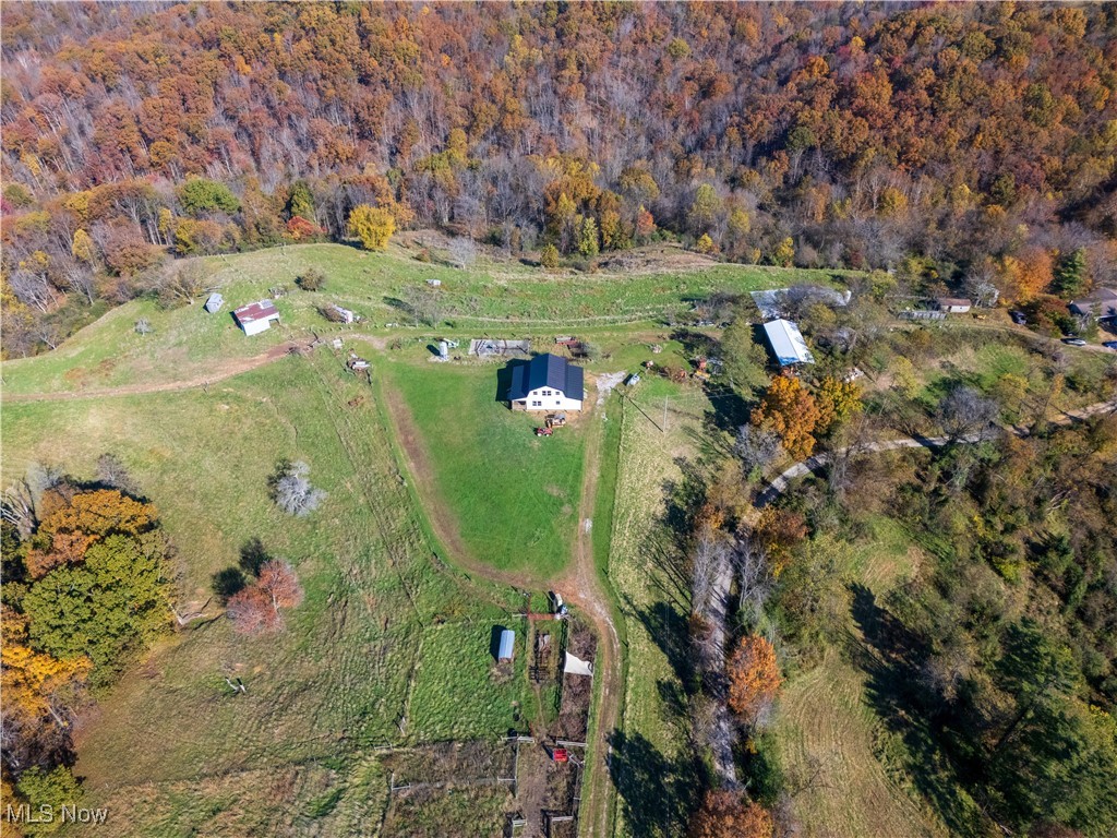 540 Wine Road Elizabeth, WV 26143 - Photo 37 of 49 Aerial view of property's location featuring a heavily wooded area