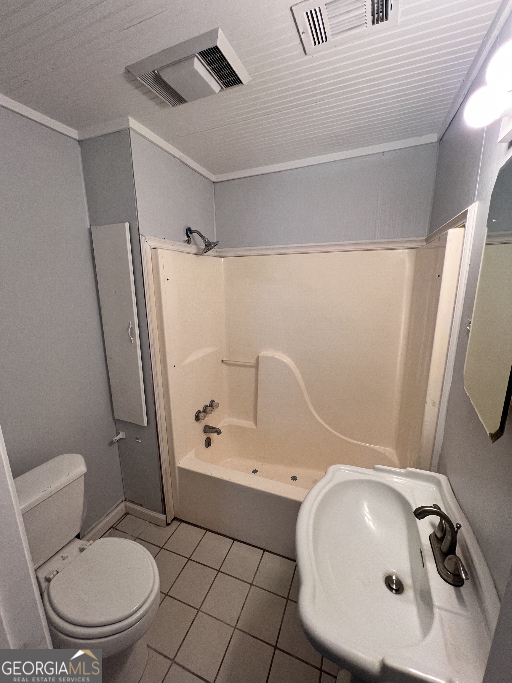 3 9th Street McRae-Helena, GA 31037 - Photo 11 of 19 a bathroom with a sink toilet and shower