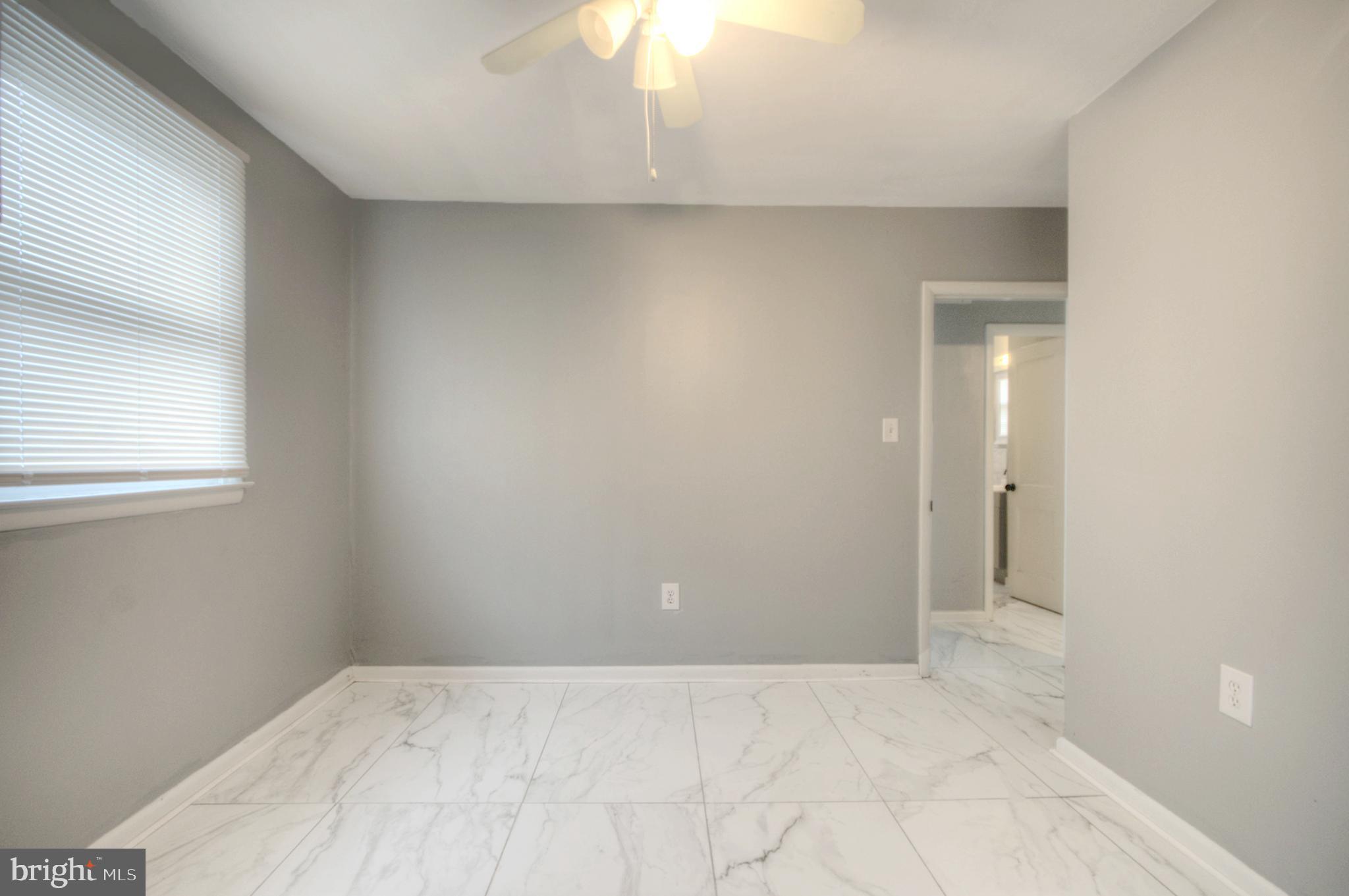 32 Fairmount Avenue Lindenwold, NJ 08021 - Photo 17 of 37 a view of an empty room and window