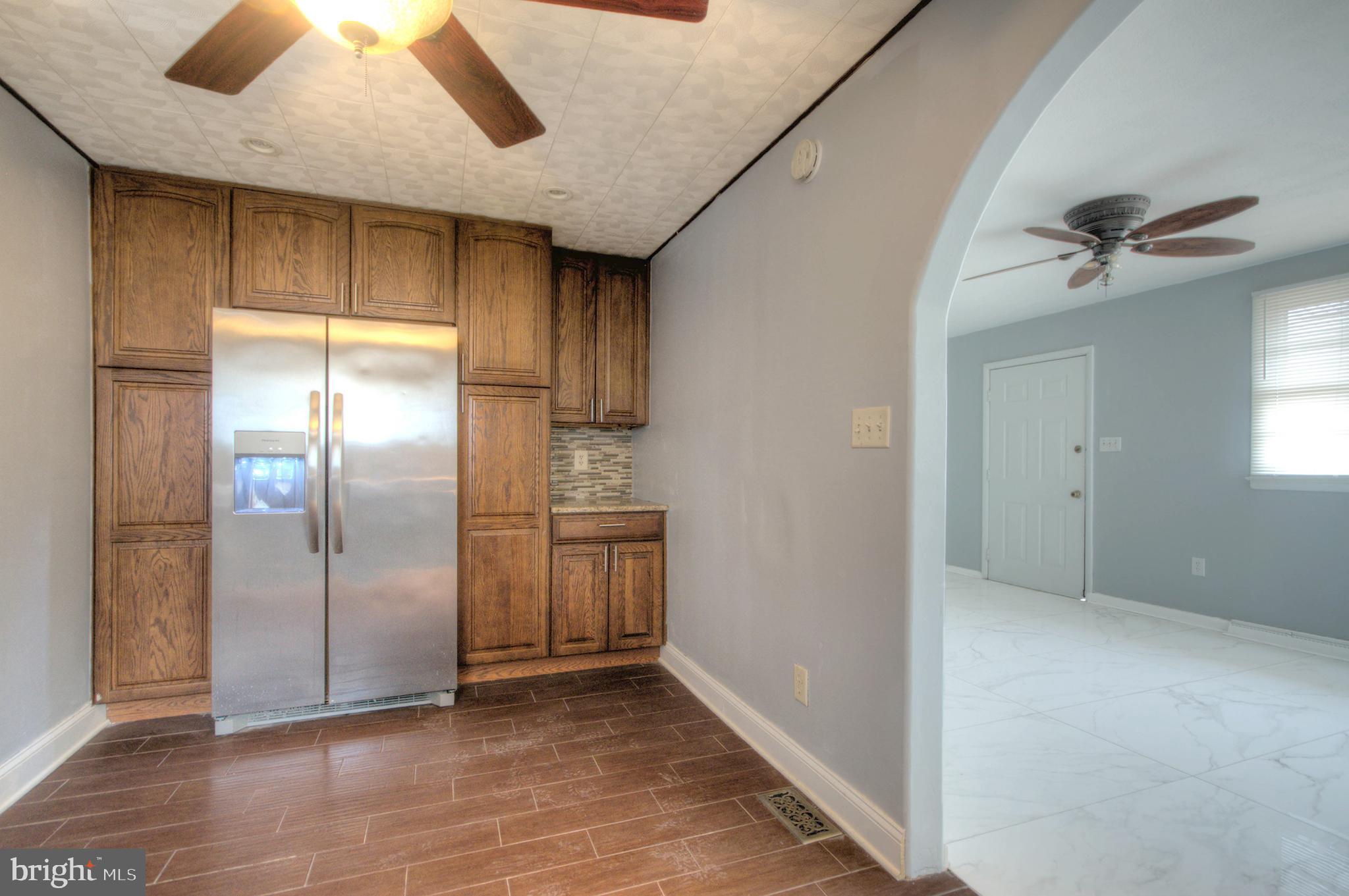 32 Fairmount Avenue Lindenwold, NJ 08021 - Photo 8 of 37 a view of an empty room with a ceiling fan