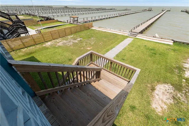 a view of a swimming pool with a balcony
