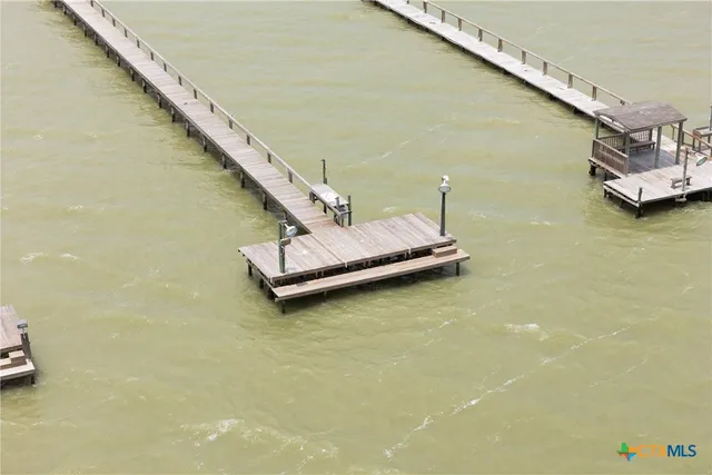 a view of a swimming pool with seating area