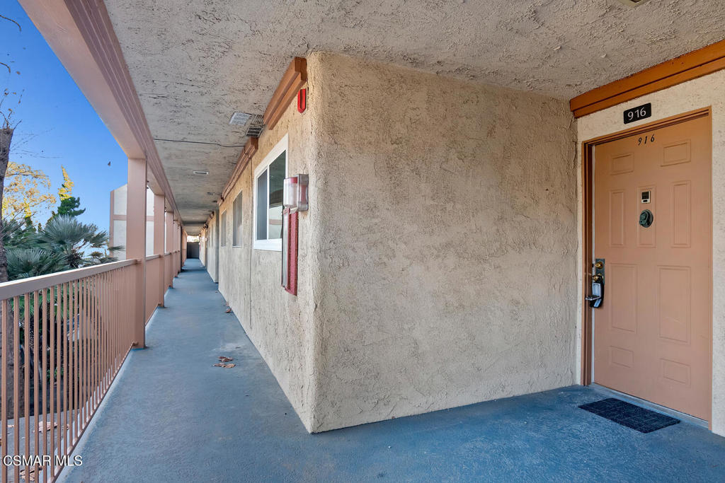 916 Lighthouse Way Port Hueneme, CA 93041 - Photo 20 of 26 a view of a hallway with wooden floor and staircase
