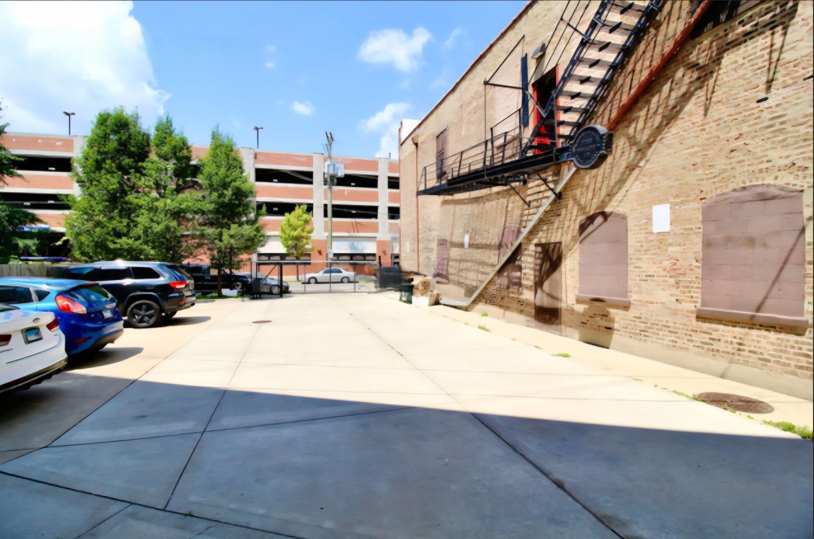 1640 West Fargo Avenue, Unit 101 Chicago, IL 60626 - Photo 22 of 22 a view of a building with car parked