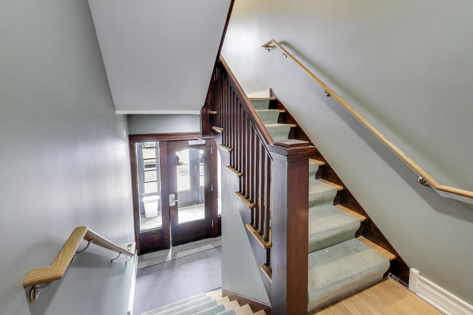 1640 West Fargo Avenue, Unit 101 Chicago, IL 60626 - Photo 4 of 22 a view of entryway and hall with wooden floor