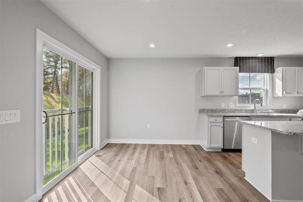 851 Ashley Road Gibsonia, PA 15044 - Photo 20 of 50 a view of a kitchen with a sink and dishwasher with wooden floor