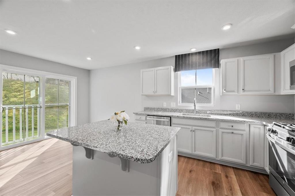 851 Ashley Road Gibsonia, PA 15044 - Photo 24 of 50 a kitchen with a sink stove and cabinets