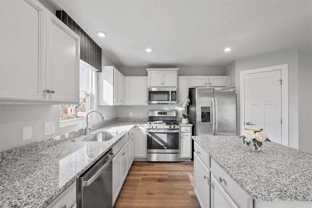 851 Ashley Road Gibsonia, PA 15044 - Photo 26 of 50 a large kitchen with stainless steel appliances granite countertop a sink stove and refrigerator