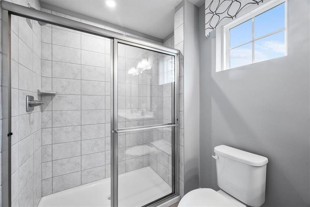 851 Ashley Road Gibsonia, PA 15044 - Photo 33 of 50 a bathroom with a toilet and a shower