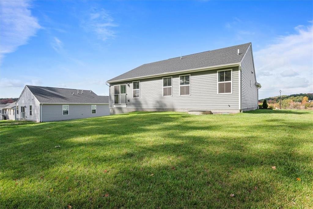 851 Ashley Road Gibsonia, PA 15044 - Photo 42 of 50 a view of a house with a yard