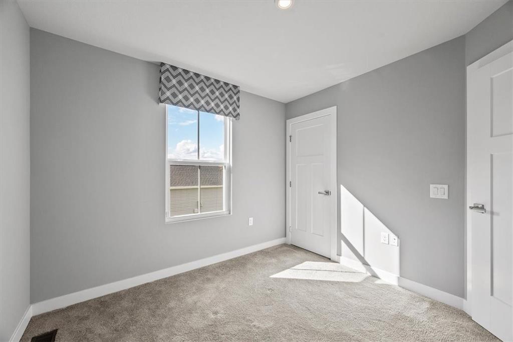 851 Ashley Road Gibsonia, PA 15044 - Photo 10 of 50 a view of an empty room with a window