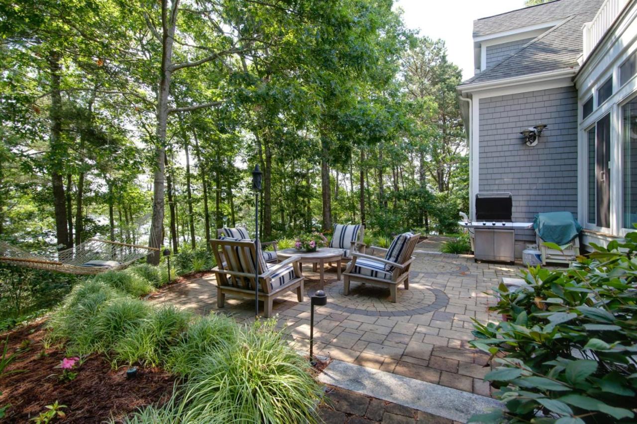 11 Harbor Ridge Road Mashpee, MA 02649 - Photo 20 of 33 a view of a backyard with sitting area