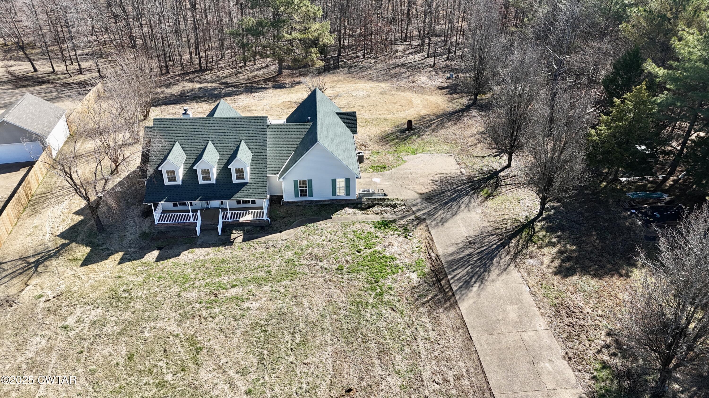 531 Diamond Grove Road Beech Bluff, TN 38313 - Photo 3 of 42 a view of a house with wooden fence