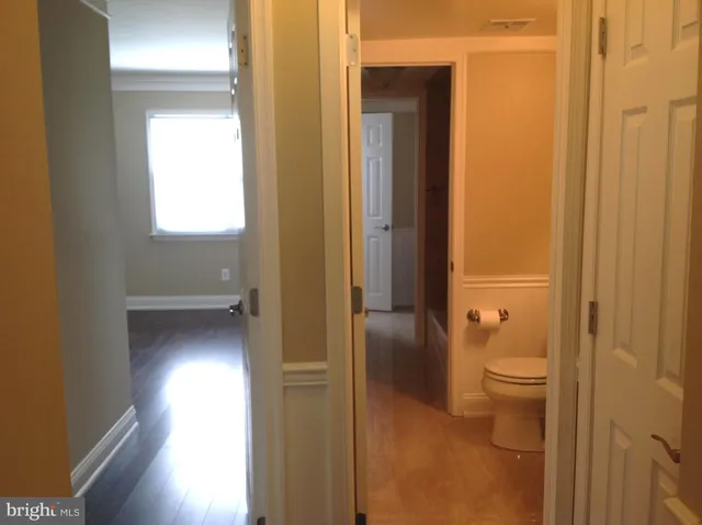 a bathroom with a toilet sink