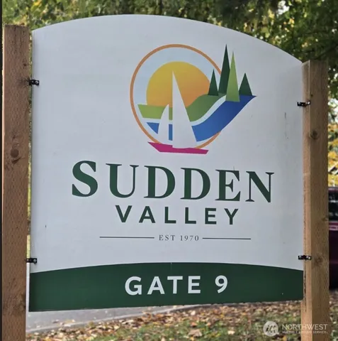 a view of a sign board with a wall