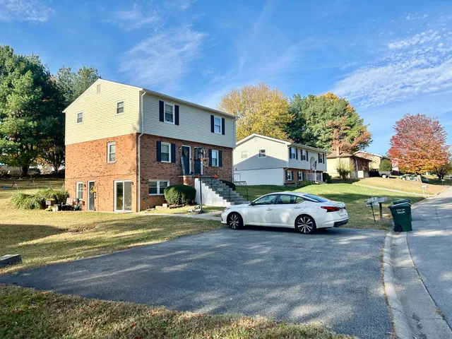 a car parked in front of a building
