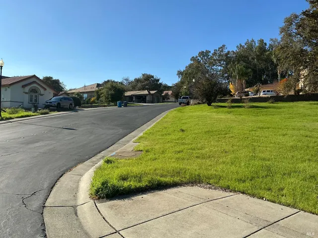 a view of a garden with houses