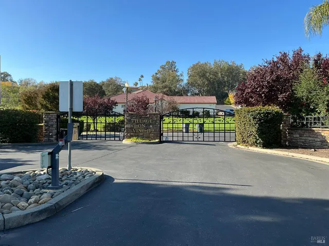 a view of a street with a building in the background