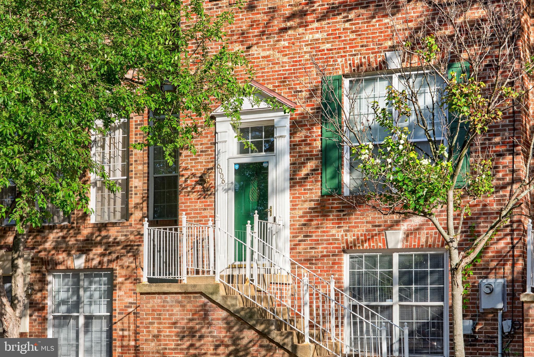 6006 Lincolnia Road Alexandria, VA 22312 - Photo 2 of 42 Charming brick facade with green accents.