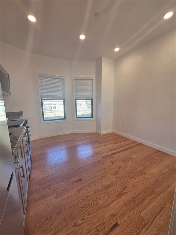 165 Hawthorne Street, Unit 303 Chelsea, MA 02150 - Photo 4 of 14 a view of livingroom and hardwood floor